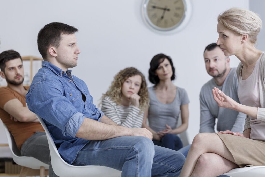 people experiencing withdrawal symptoms gather for behavioral intervention