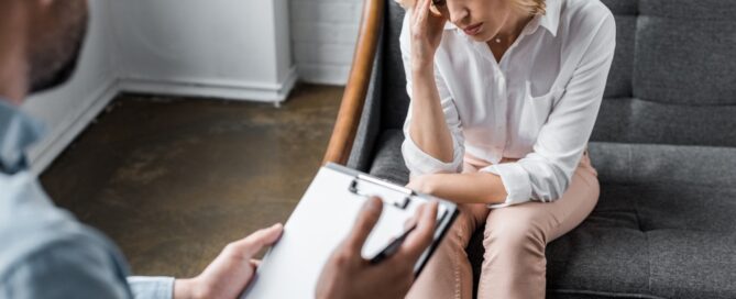 woman having psychologist therapy session at office