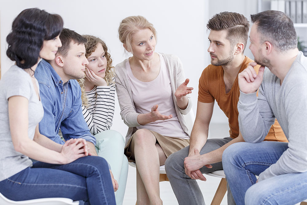 group therapy session at an addiction treatment center during detox