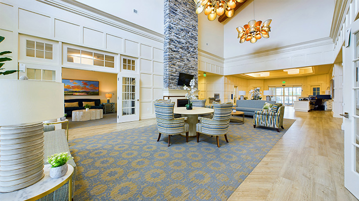 a very spacious and pleasant lobby with plenty of sunlight and seating.